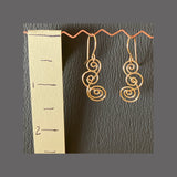 Gold wire earrings, overlapping spirals