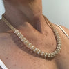 woven gold necklace with freshwater pearls